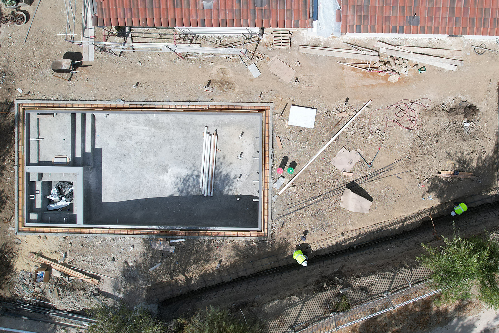 An aerial view of a property under construction